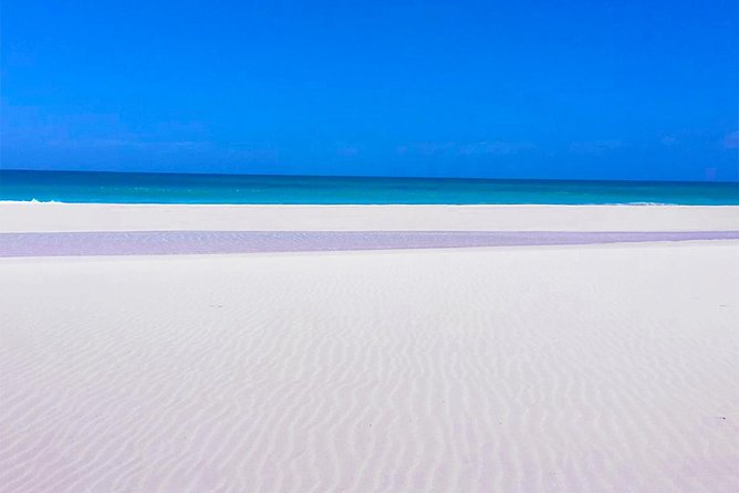 Boa Vista Tour: Santa Mónica, Desert & Shipwreck - Exploring the caves at Praia da Varandinha