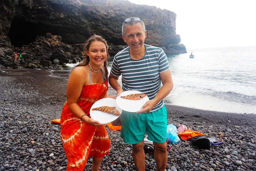 From Praia: Boat Trip, Snorkeling, Cave & BBQ on the Beach - A black-sand beach lunch with a local feel