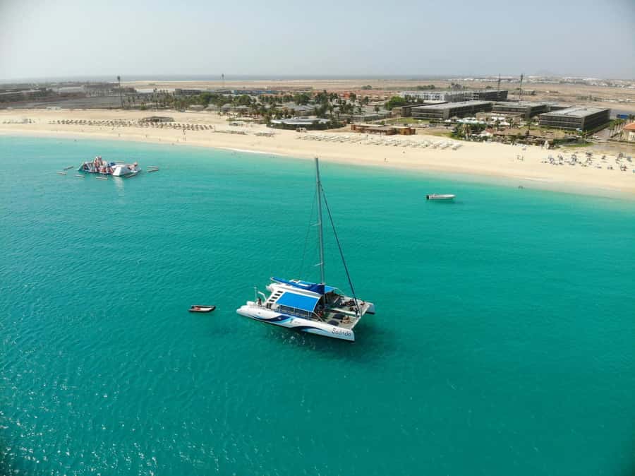 Catamaran anchored off the beach at Santa Maria, Sal